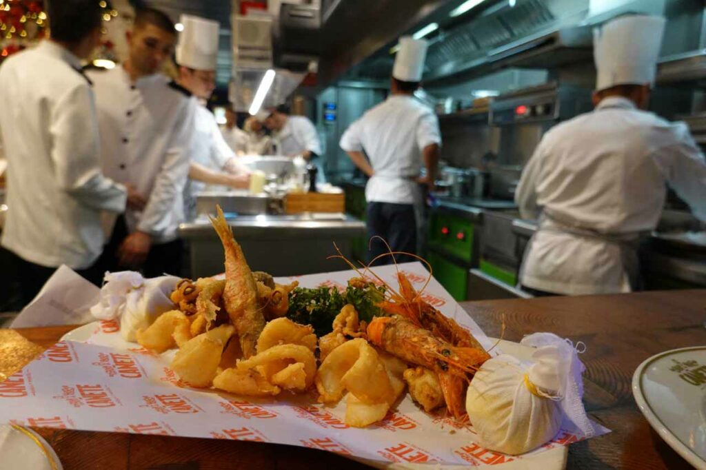 Mixed fried seafood on the bar in front of the kitchen atBar Cañete in Barcelona