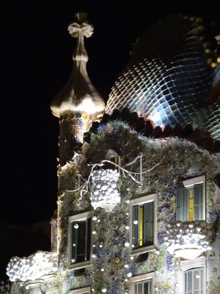 The roof of Casa Batlló in Barcelona with Christmas decorations at night